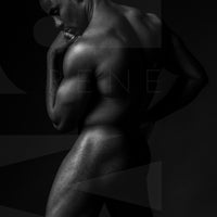 Black and white fine art photo showing a sideview of a nude black man from head to mid thigh with one arm bent and chin resting on closed fist.