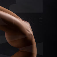 photo showing a sideview of a naked woman in a handstand pose with back arched, the photo is cropped to show only her torso.