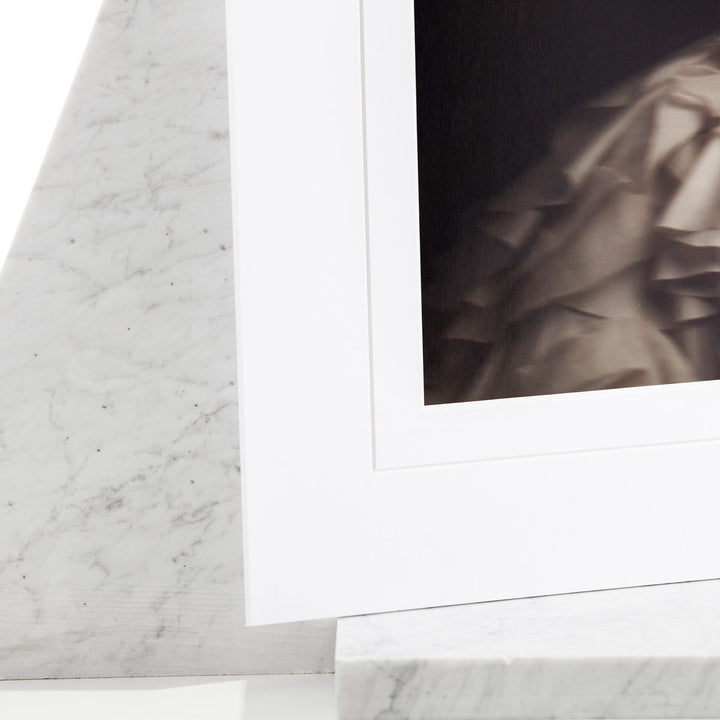 Close up of a matted print, showing mat and photograph